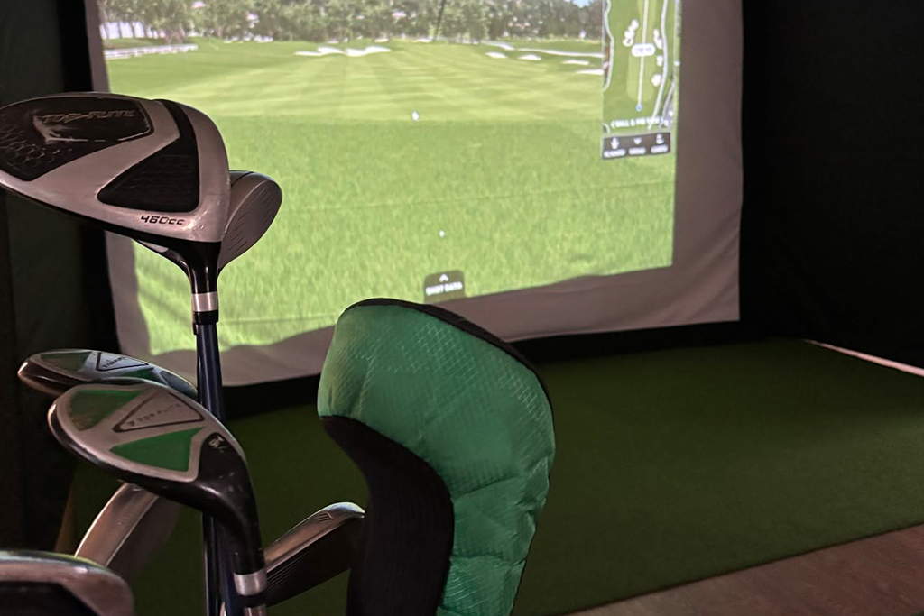 closeup of clubs at simulator